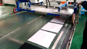Dry under base silicone printing by auto table dryer